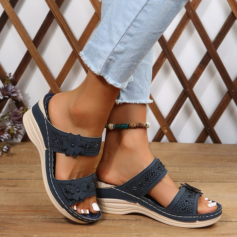 Birgit | High-heel wedge slippers with floral motif